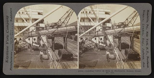 Loading coffee on ship by machinery, Santos, Brazil, So. Am