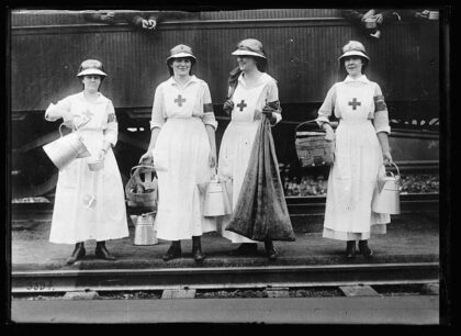 Carrying Red Cross cheer to soldiers and rookies on their way to camps and cantonments