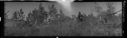 Wisconsin camp, fisherman at rustic camp, pan and coffee pot on campfire